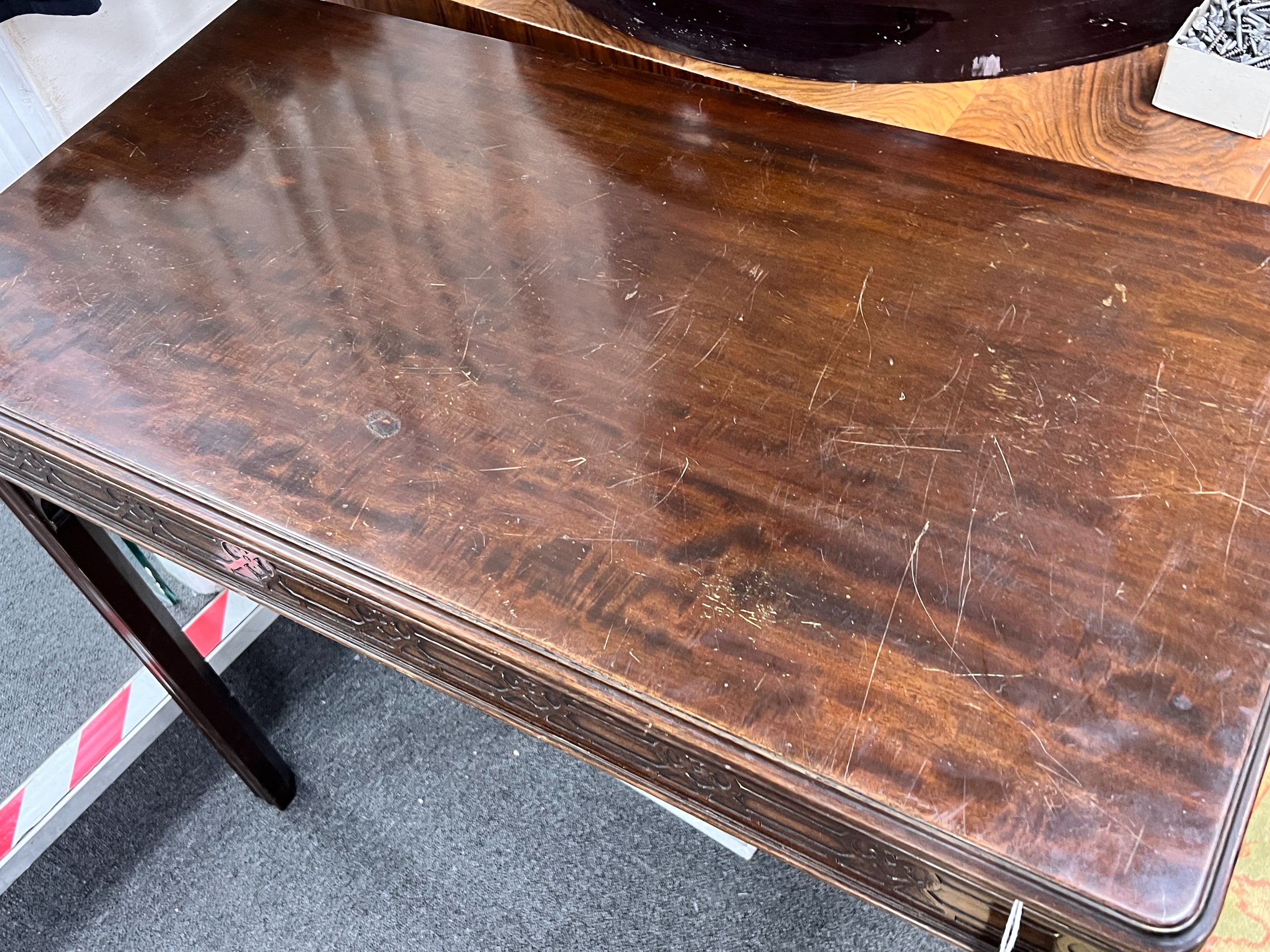 An Edwardian Chippendale revival rectangular mahogany folding card table, width 91cm, depth 46cm, height 76cm